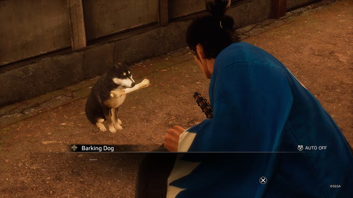 Like a Dragon Ishin review - Ryoma gives a bone to a barking dog