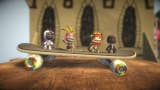 Four cute LittleBigPlanet characters standing on a skateboard