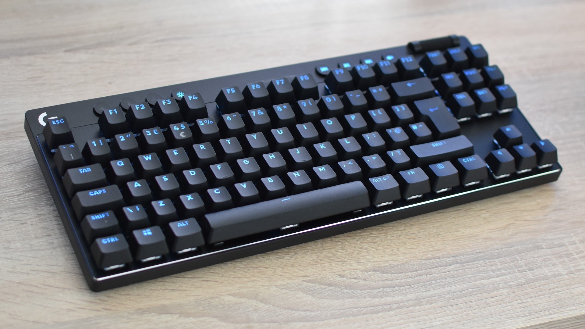The Logitech G Pro X TKL gaming keyboard on a desk. - 6