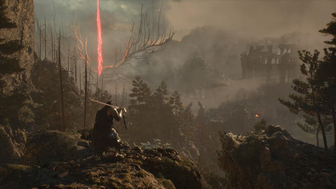 Player character in Lords of the Fallen looks out over forest and mountains