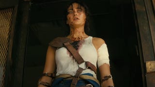 Screenshot from Amazon's Fallout trailer showing Lucy, played by Ella Purnell. She looks bloodied, bashed and weary, with a bandage over her upper arm