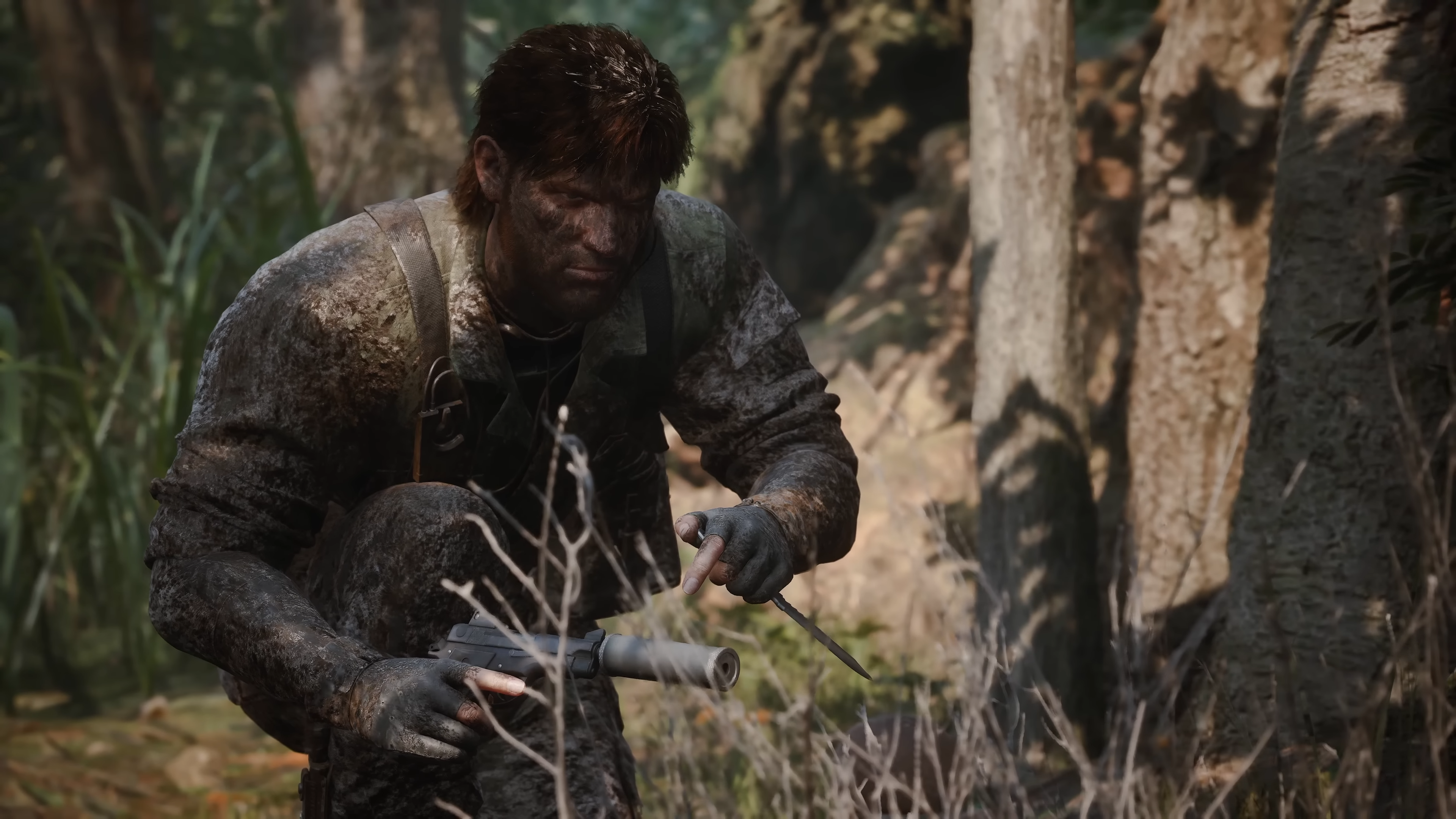 Close up of Snake crouching in the forest in Metal Gear Solid Delta: Snake Eater