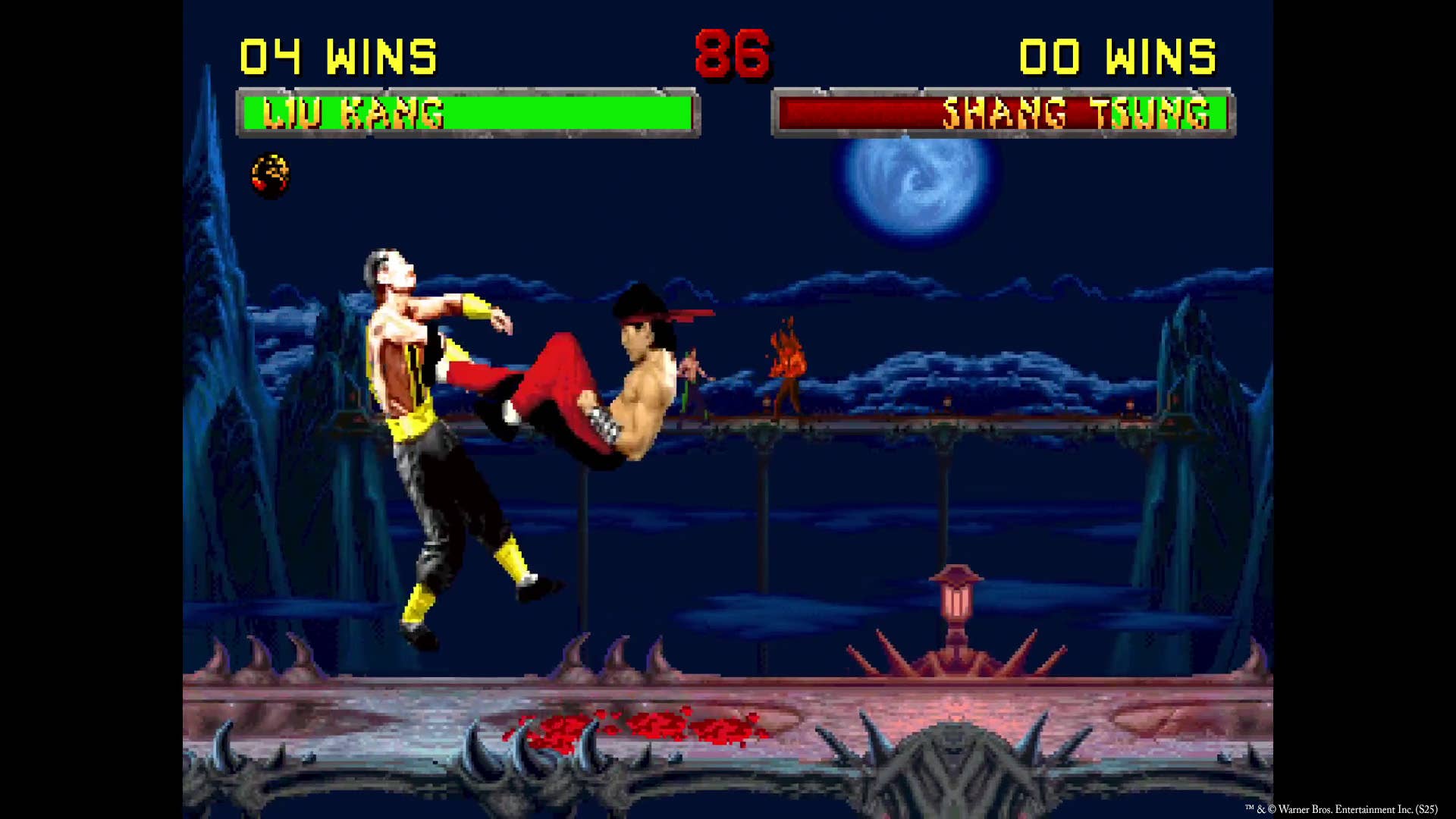 Screenshot from Mortal Kombat Legacy Kollection showing Liu Kang kicking Shang Tsung