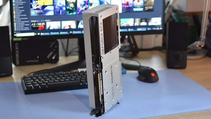 The Gigabyte GeForce RTX 4070 Ti Super Aero OC graphics card stood upright on a desk.