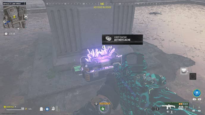 The player looks at a lootable aether cache covered in crystals in MW3 Zombies
