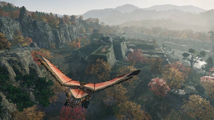 Rise of the Ronin official screenshot showing the play paragliding over forest