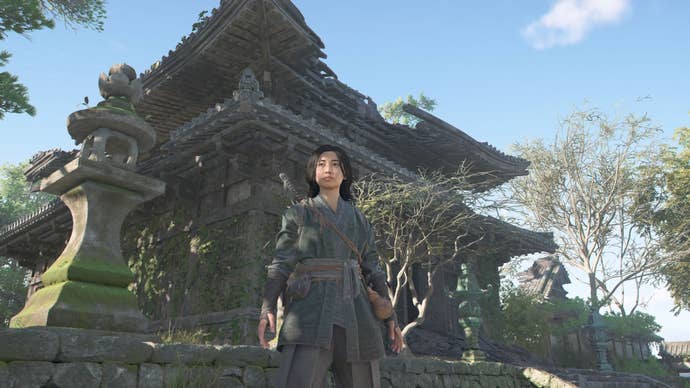 Naoe standing in front of Makinoodera Temple in Assassin’s Creed Shadows.