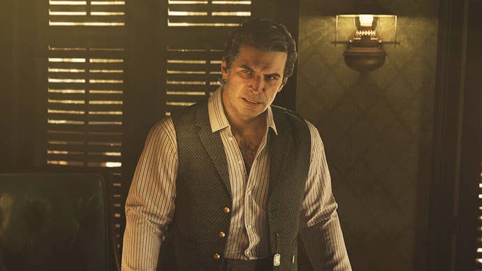 Male character in Mafia The Old Country standing in a darkened but plush looking home office type room