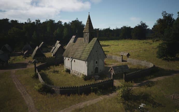 A wooden church in a grassy field in Manor Lords