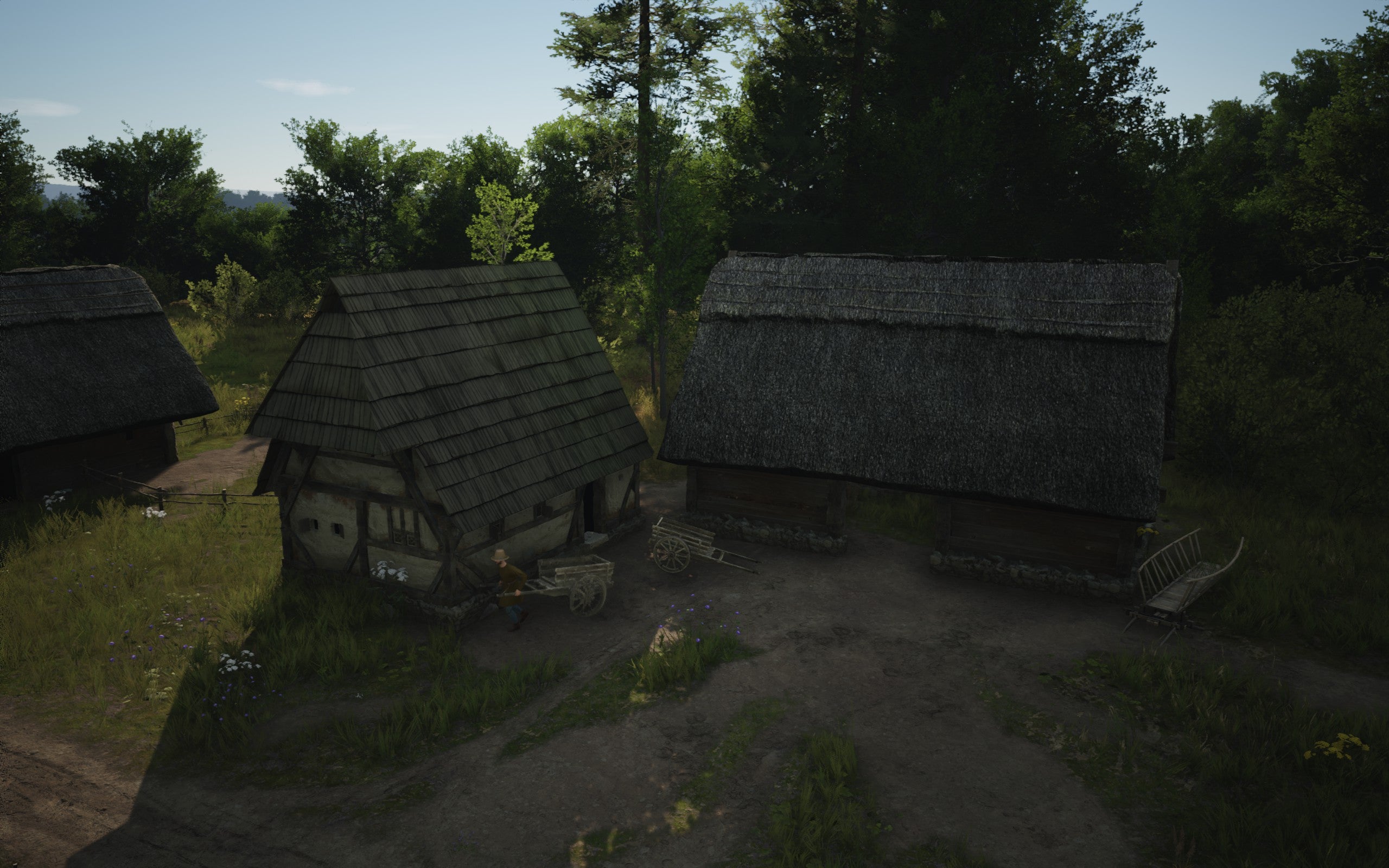 A trading post building in Manor Lords during the spring