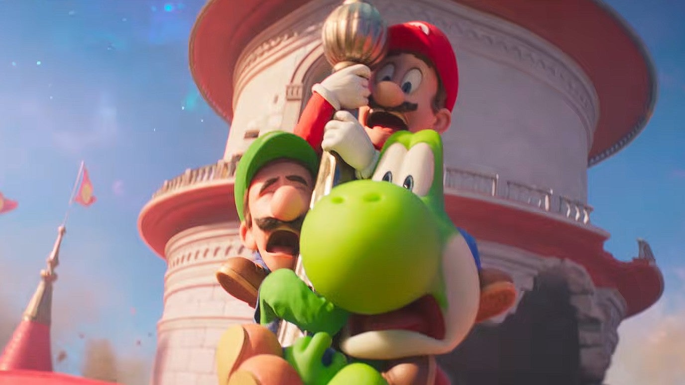 Mario, Yoshi and Luigi cling onto a tower on Peach's Castle in The Super Mario Galaxy Movie trailer