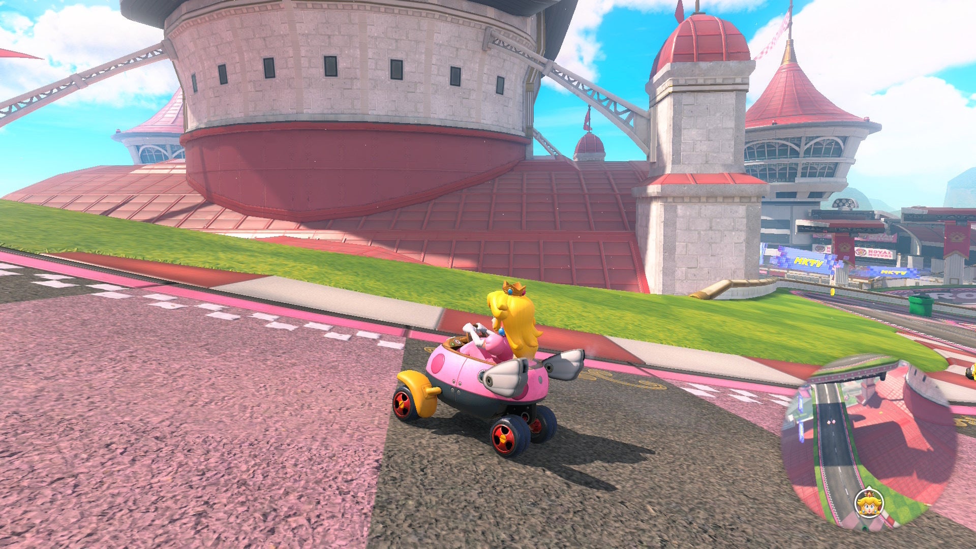 Peach can be seen looking at the rooftop of Peach's Castle in Mario Kart World - 3
