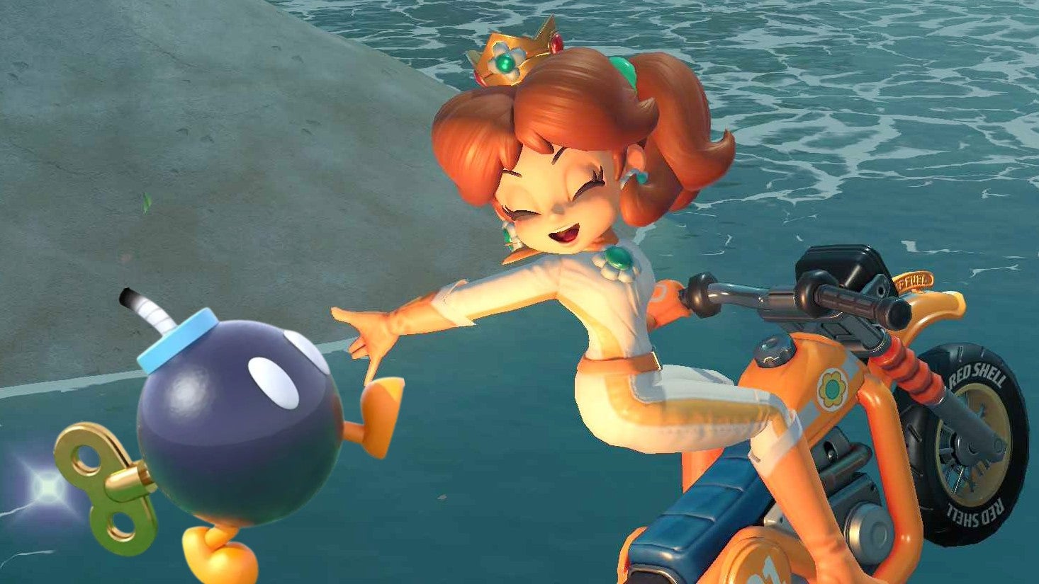 Mario Kart World screenshot of Daisy going over a jump with a Bob-Omb overlaid on top