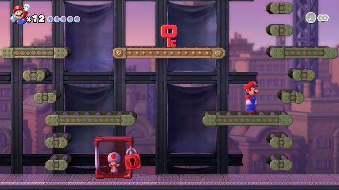 Mario has to get to a platform with a red key to free a Toad from a red cage