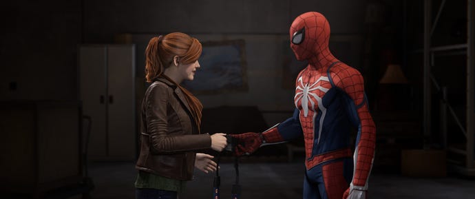 Spider-Man hands Mary Jane Watson her camera in Marvel’s Spider-Man Remastered.