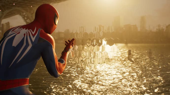 Spider-Man stares at the sunset over the waters near Manhatten.