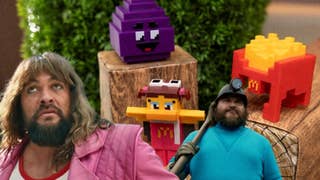 Mcdonalds Minecraft collectables on a log with Jason Momoa and Jack Black as their characters in A Minecraft Movie