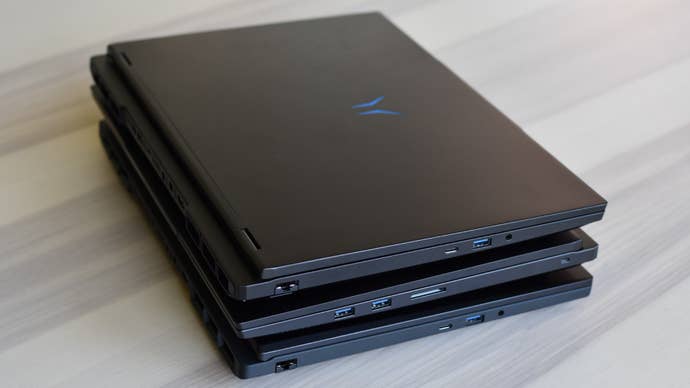 Three Medion Erazer RTX 50 gaming laptops stacked connected apical of each other.