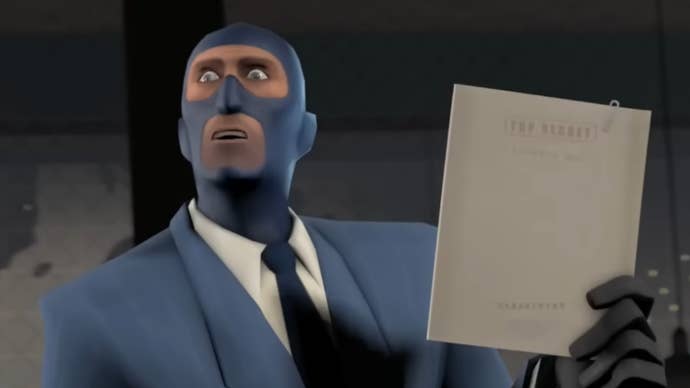 Team Fortress trailer screenshot showing male spy character in balaclava holding a Top Secret file