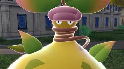Close up of Mega Victreebel, a bright yellow and green plant monster Pokemon