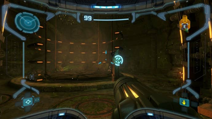 Samus aims at a panel by an elevator in Metroid Prime Remastered