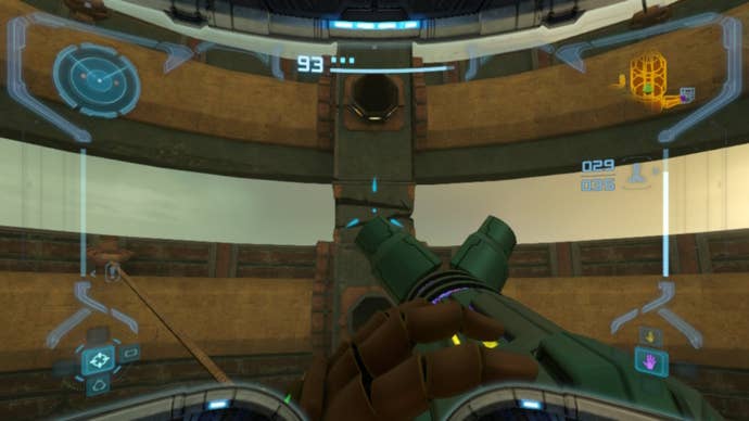 Samus aims at weak bricks in a pillar in Metroid Prime Remastered