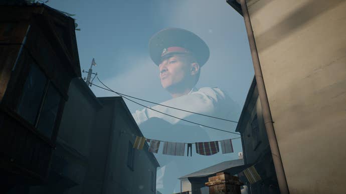 A cloudy presumption of a immense policeman, framed successful the entity supra rooftops hung with washing lines. From Militsioner.