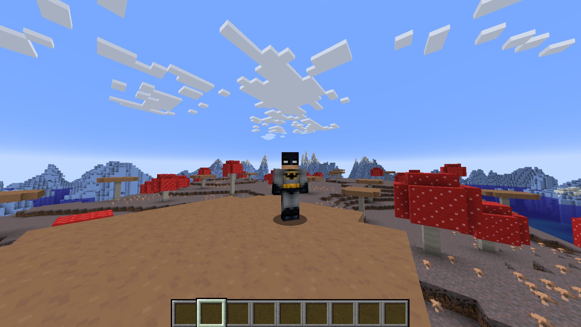 The player, wearing the Batman skin, stands on a mushroom island in Minecraft