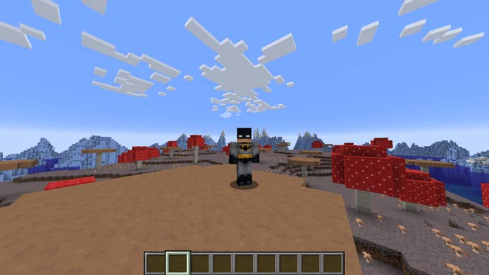 The player, wearing the Batman skin, stands on a mushroom island in Minecraft