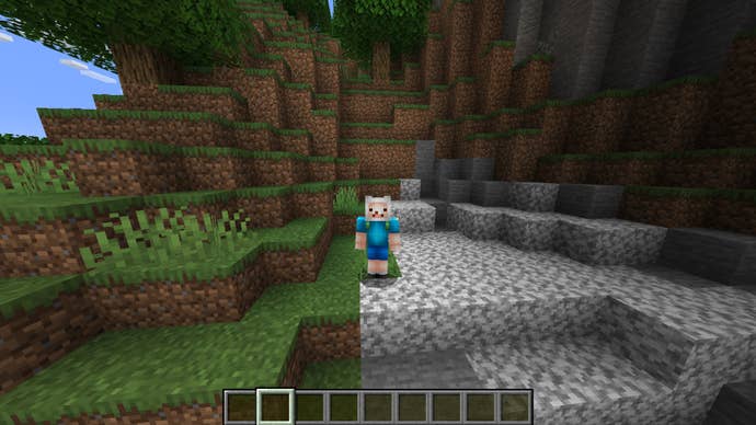 The player, wearing the Finn the Human (Adventure Time) skin, stands at the top of a cave network in Minecraft