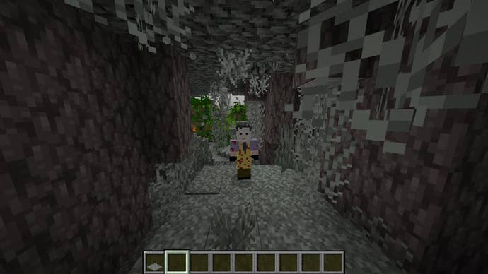 The player is wearing a Leatherface skin while standing in the pale garden biome in Minecraft
