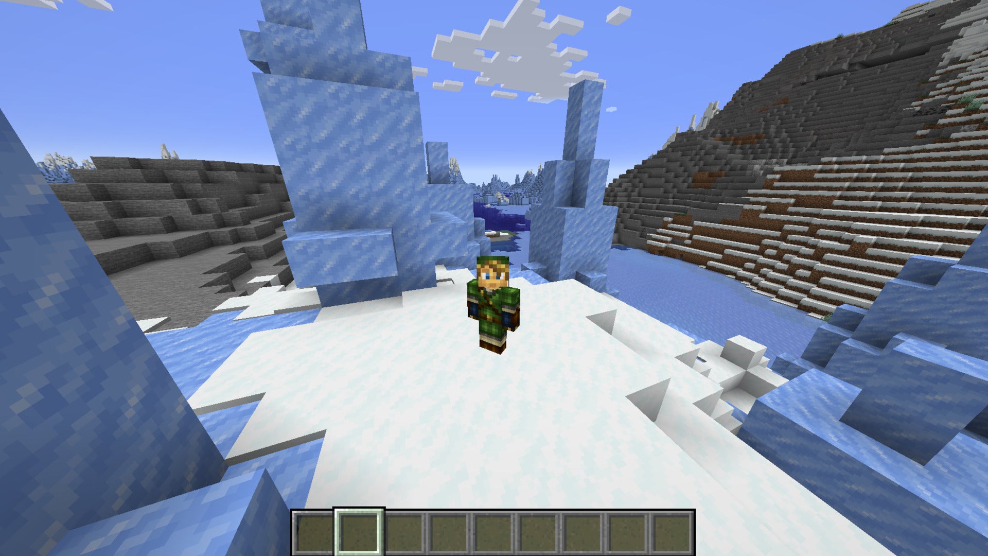 The player, wearing a Link (Zelda) skin, stands in a snowy biome in Minecraft - 14