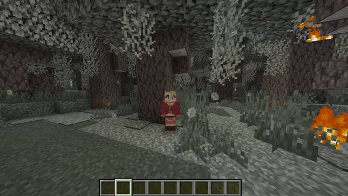 The player, wearing the Maria (Silent Hill 2) skin, stands beside some trees in the pale garden biome in Minecraft