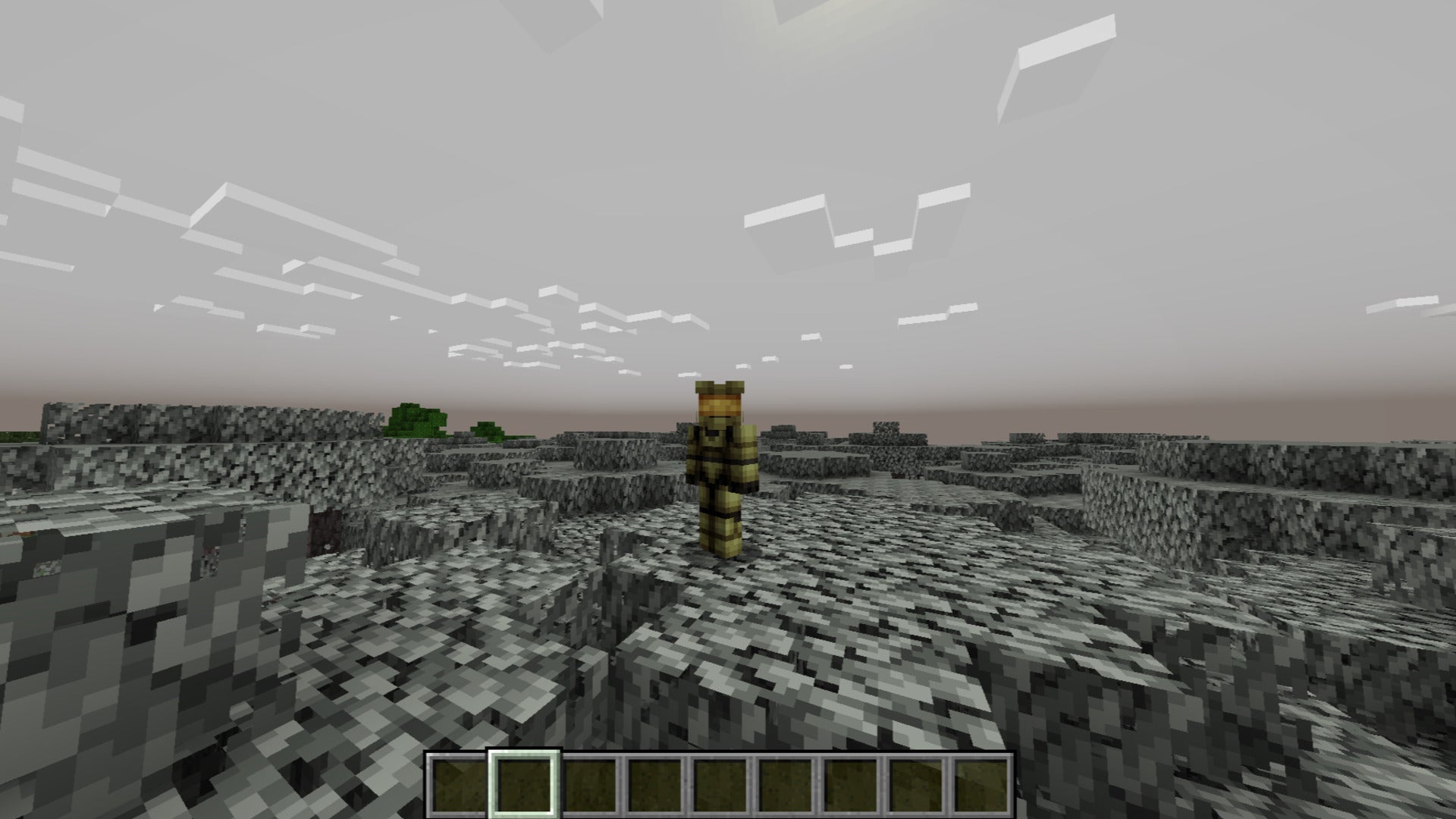 The player, wearing the Master Chief skin, stands atop a tree in the pale garden biome in Minecraft
