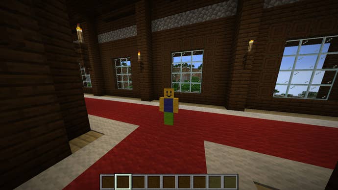 The player is wearing a Roblox Noob skin while standing inside of a woodland mansion in Minecraft