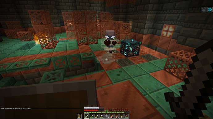 Fighting a Breeze in one of Minecraft’s Trial Chambers.