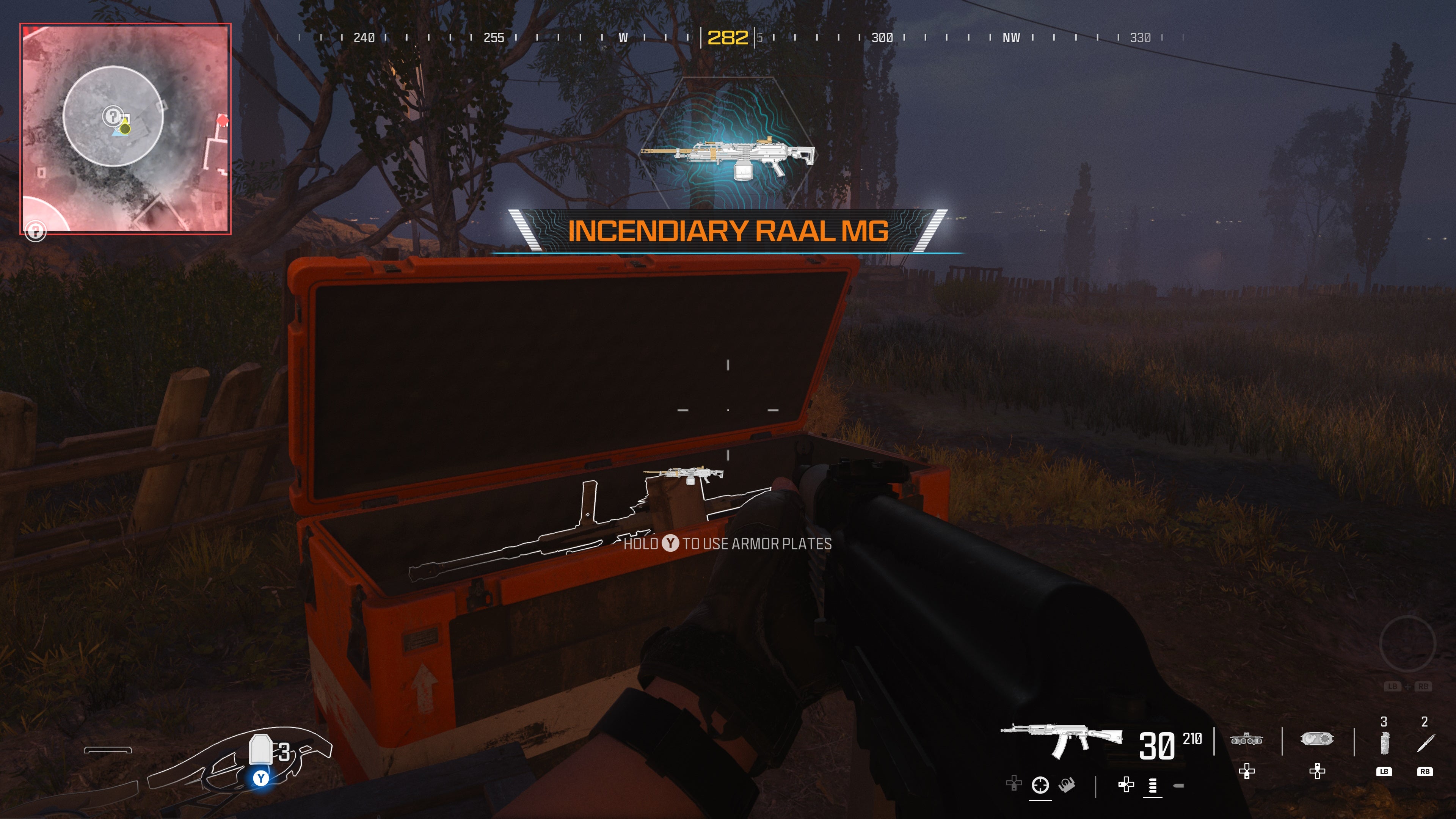 looking at an orange container with a weapon inside as part of the crash site level