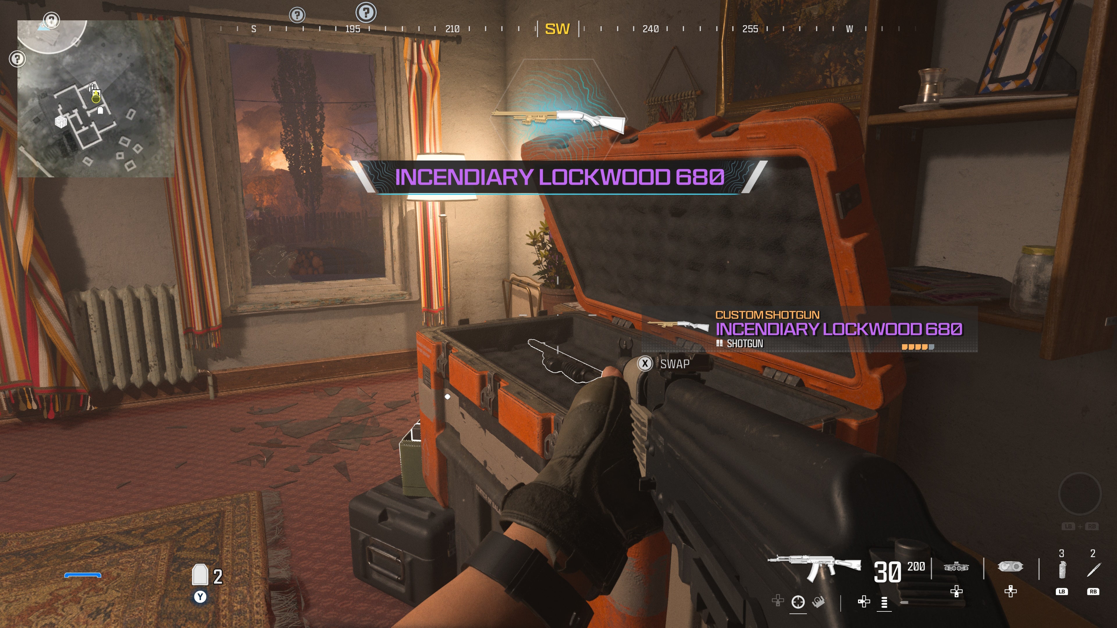 looking at an orange container with a weapon inside as part of the crash site level