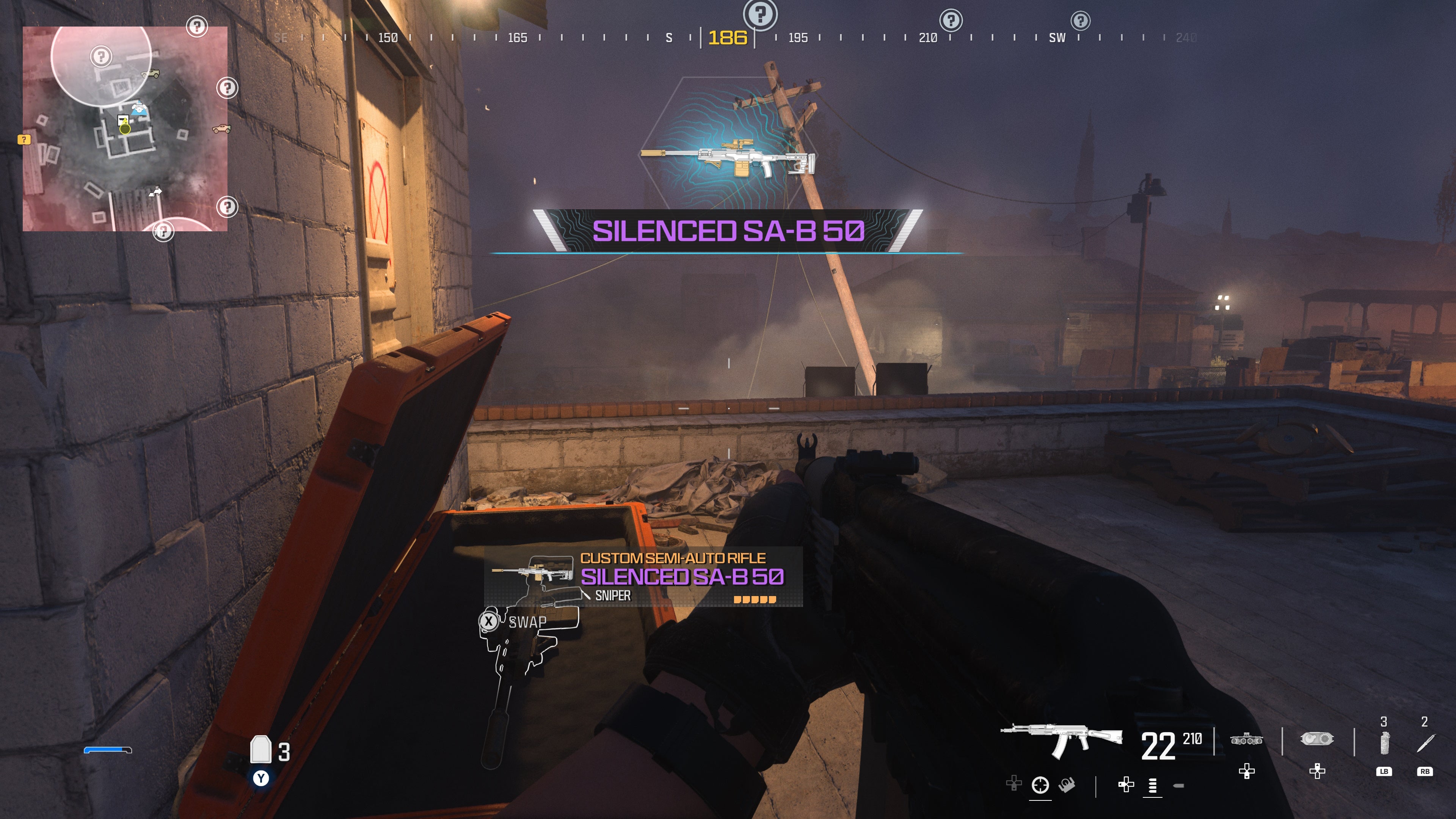 looking at an orange container with a weapon inside as part of the crash site level