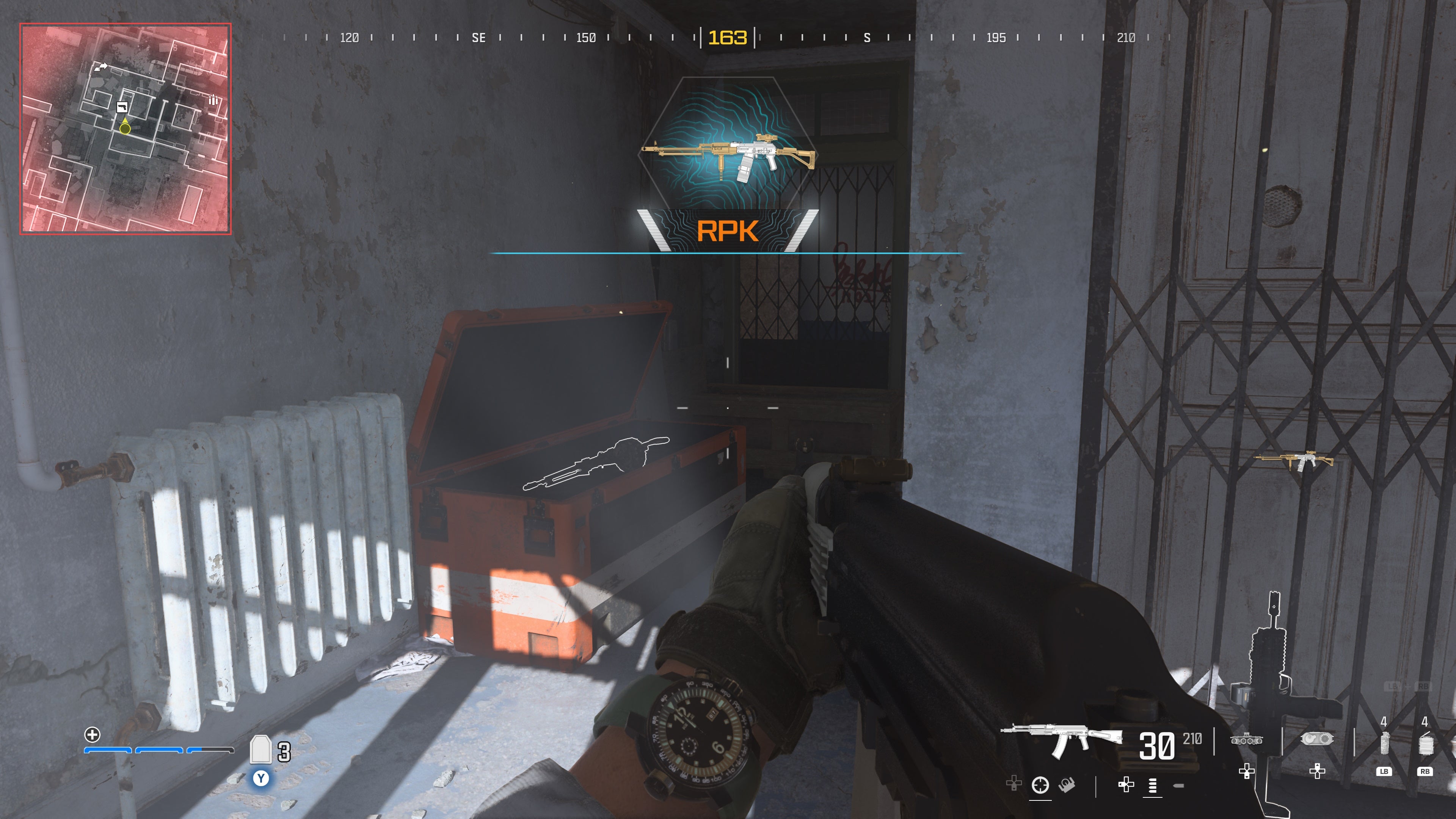 looking at a supply box with a weapon inside on the highrise map