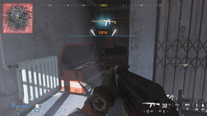 looking at a supply box with a weapon inside on the highrise map