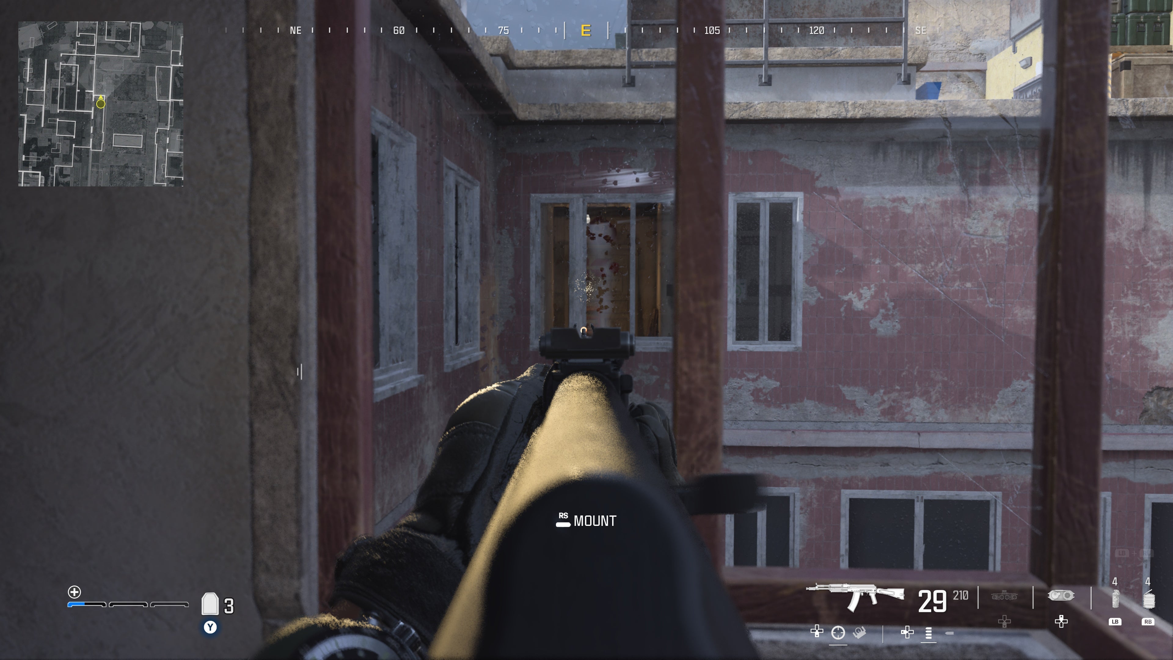 looking across a small hap at window showing a chair blocking a door