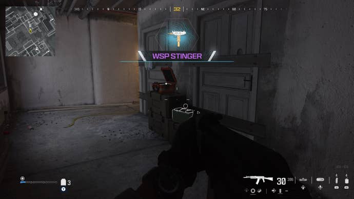 looking at a supply box with a weapon inside on the highrise map