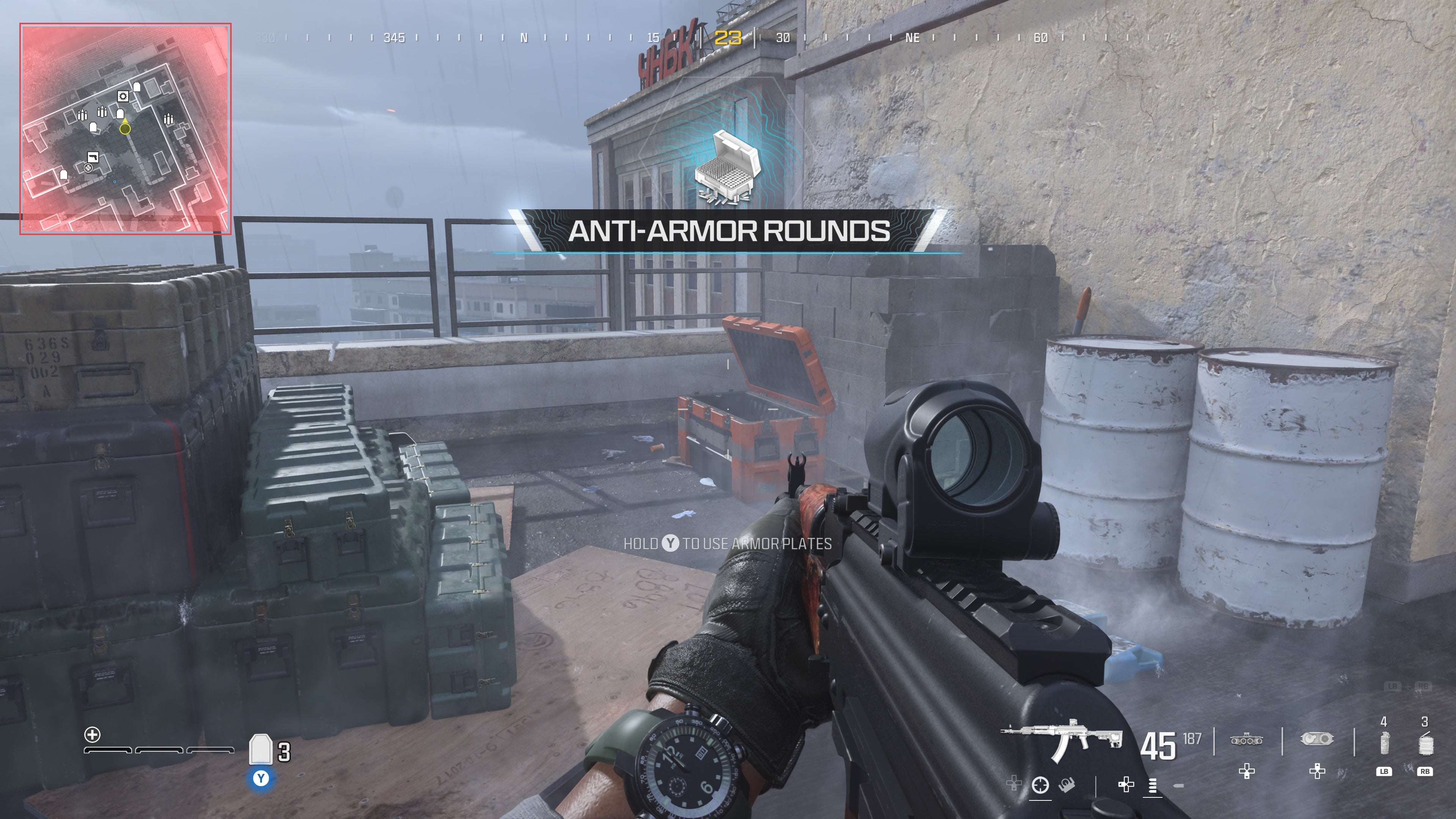 looking at a weapon supply box on a rooftop on the highrise map