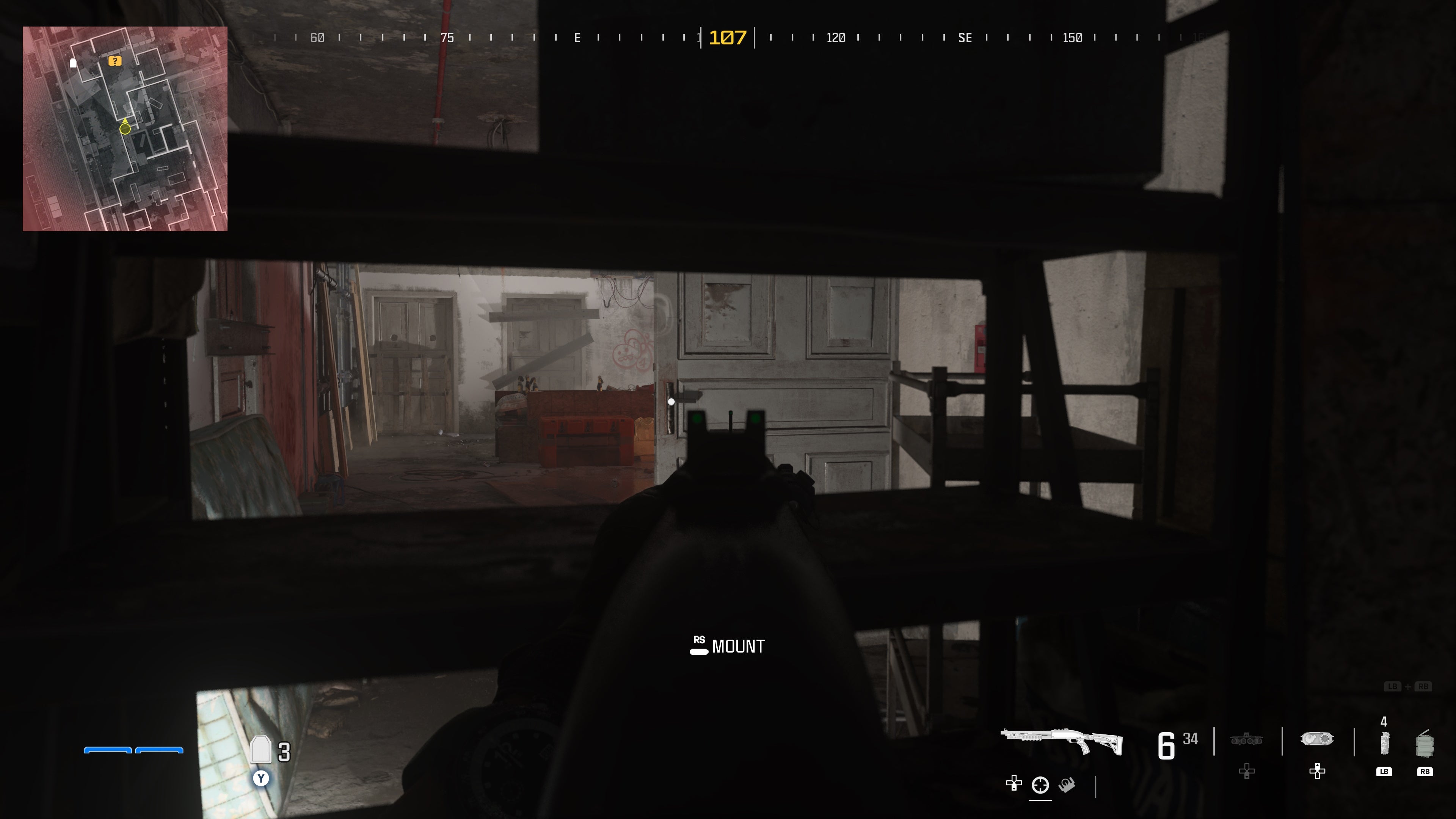 pointing an assault rifle at a door through a bookcase