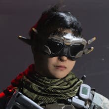 cropped dokkaebi operator from the chest up who is wearing think goggles