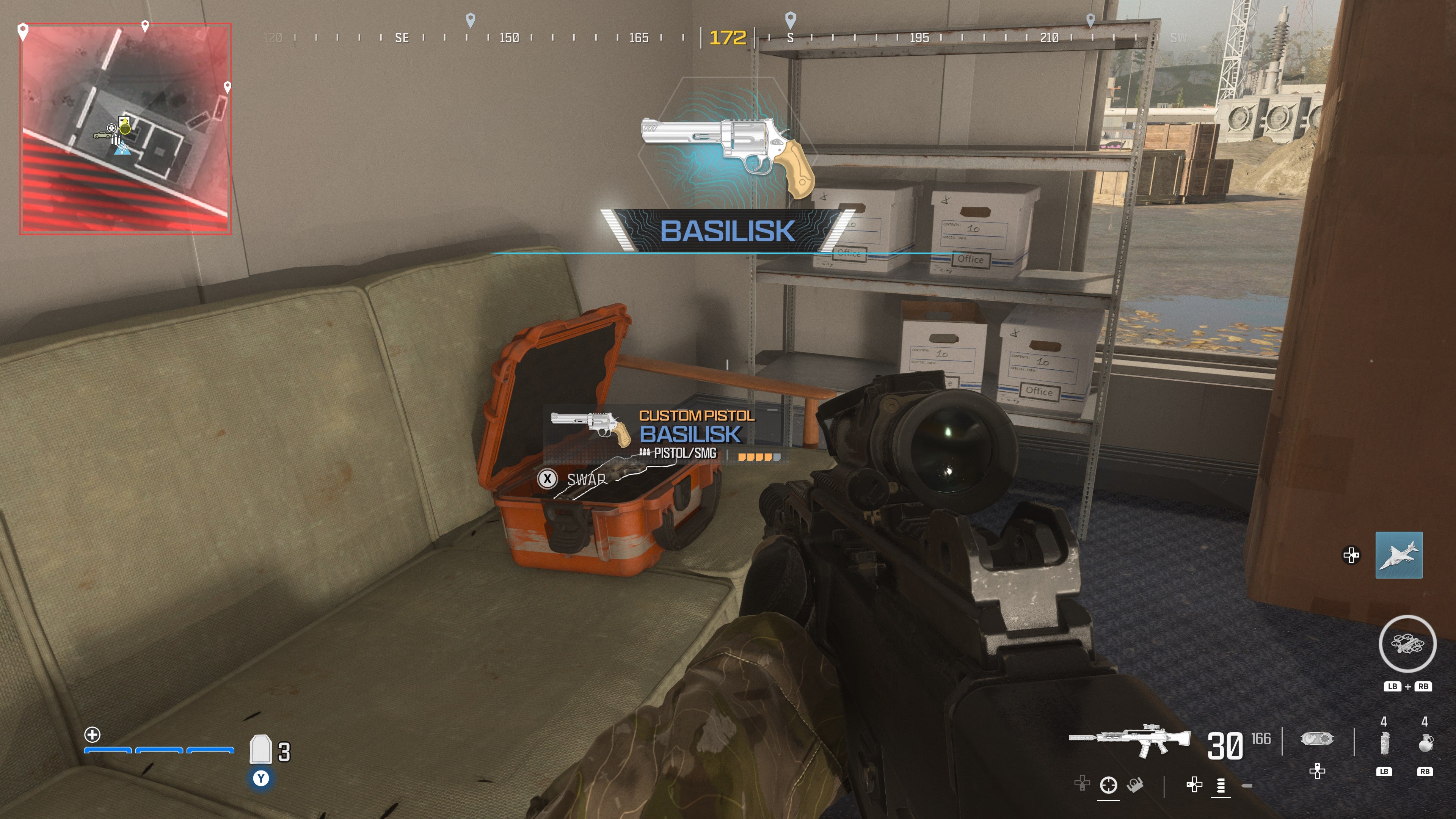 looking at an item in an open orange supply box on the reactor level