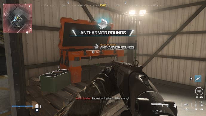 looking at an item in an open orange supply box on the reactor level