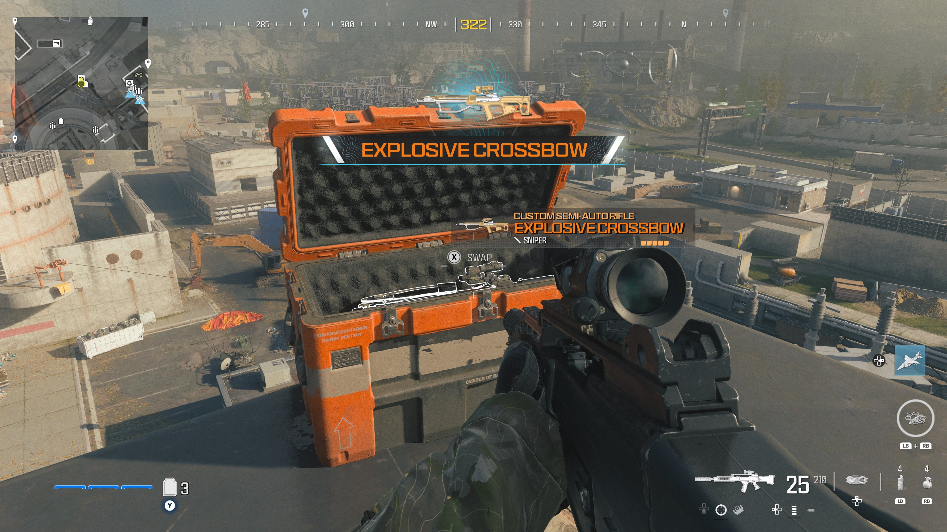 looking at an item in an open orange supply box on the reactor level