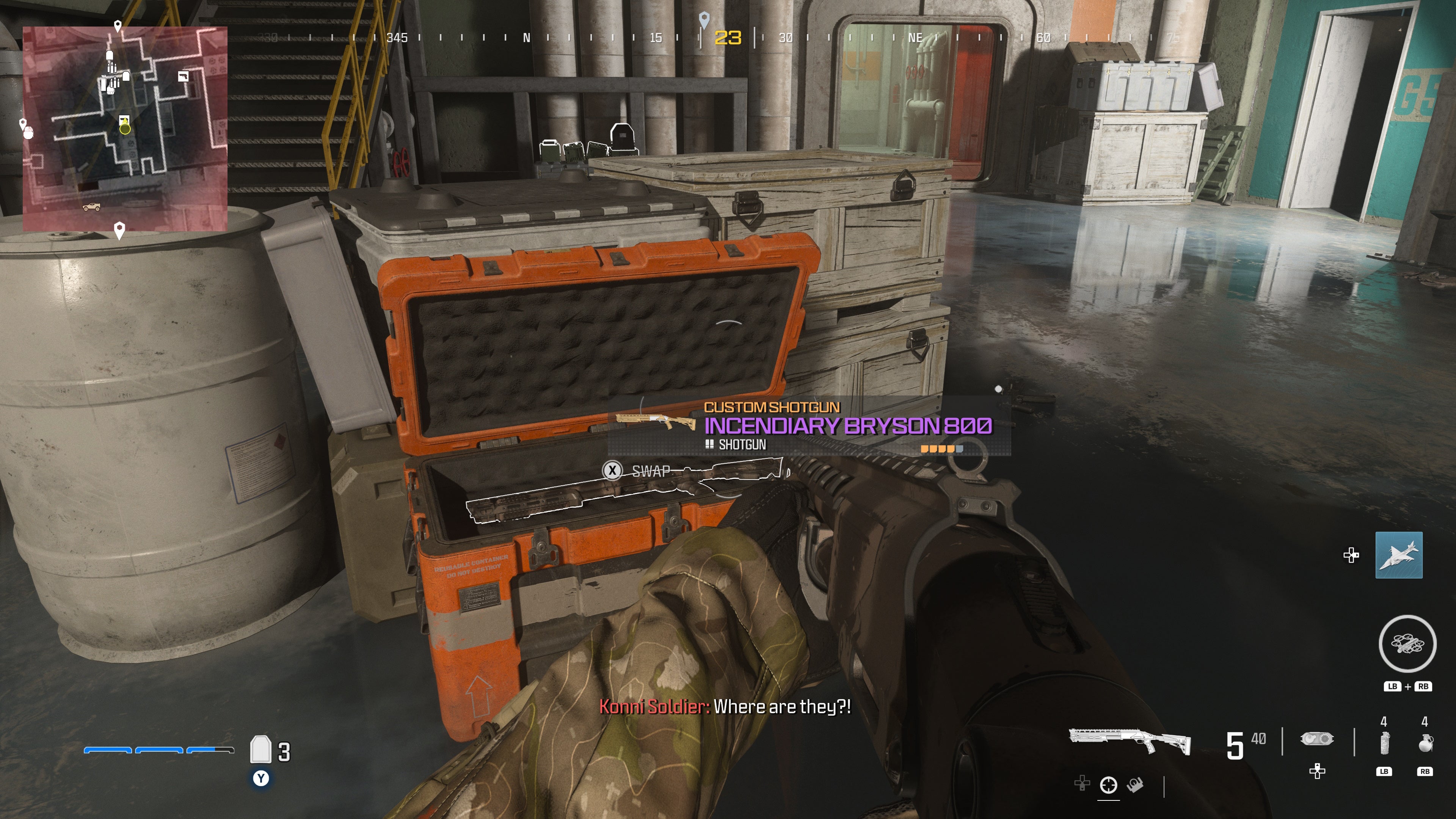 looking at an item in an open orange supply box on the reactor level